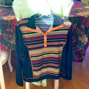 Size large perfect top for the holidays a little glitz in the front long sleeves